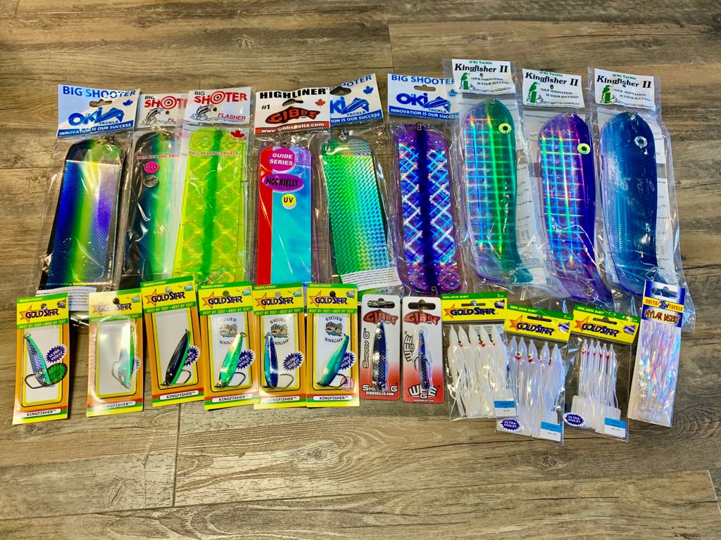 A collection of bright and shiny fishing lures and hooks